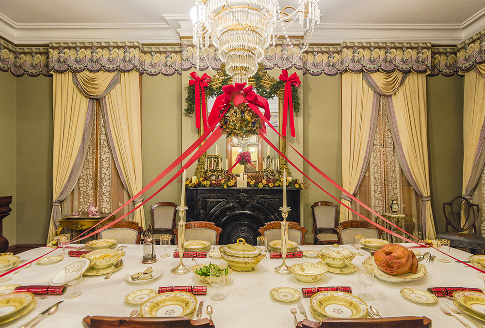 Photograph of the Harrison dining room decorated for Christmas.