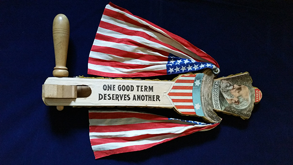 1892 Campaign Rattler for President Benjamin Harrison and Vice Presidential candidate Whitelaw Reid. The side of the rattler in this image shows the quote, 