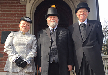 Photographic image of reenactors dressed as the Harrison family.